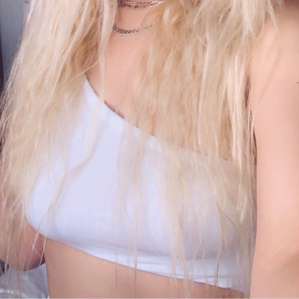 White asymmetrical one piece